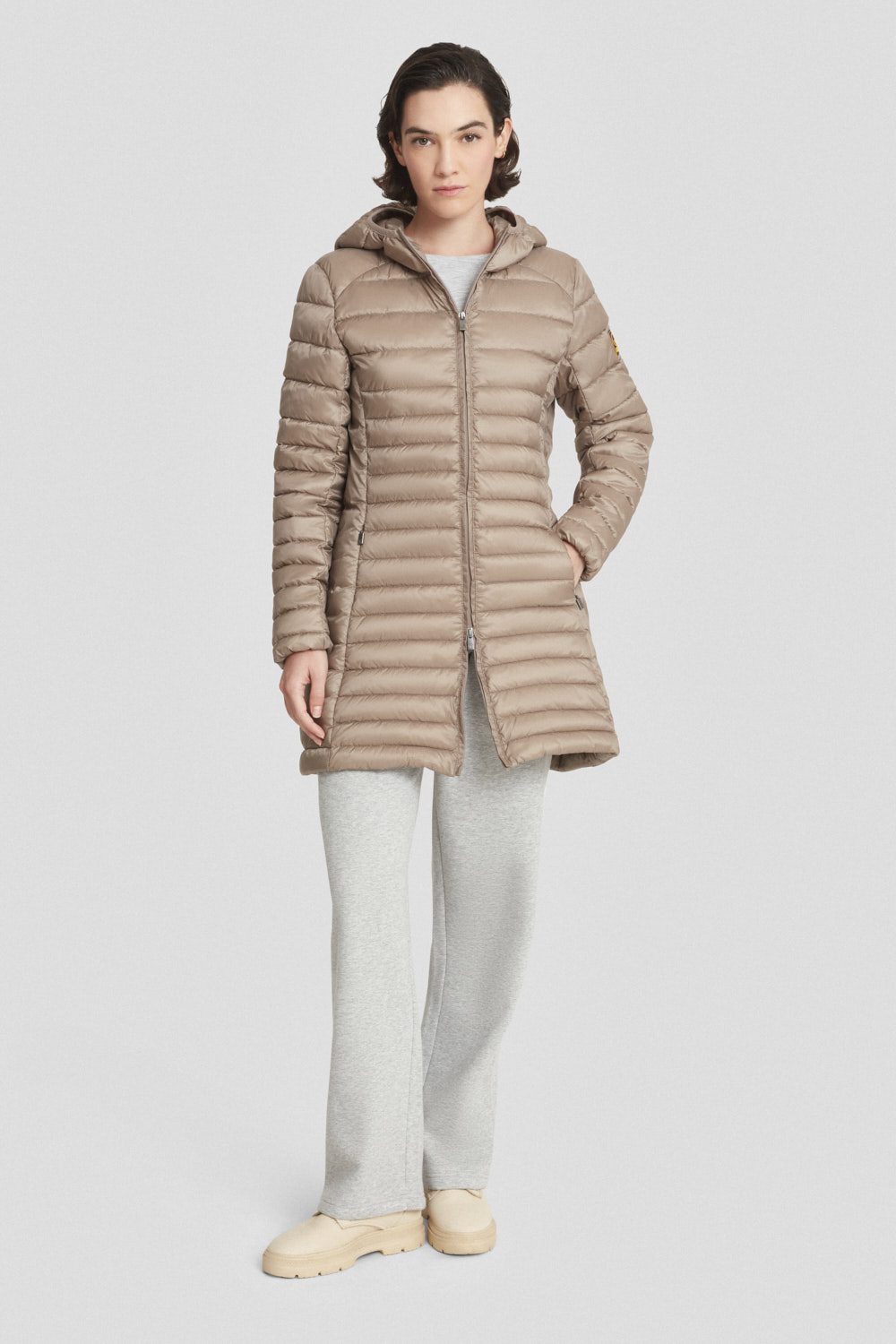 Piumino lungo marrone trapuntato