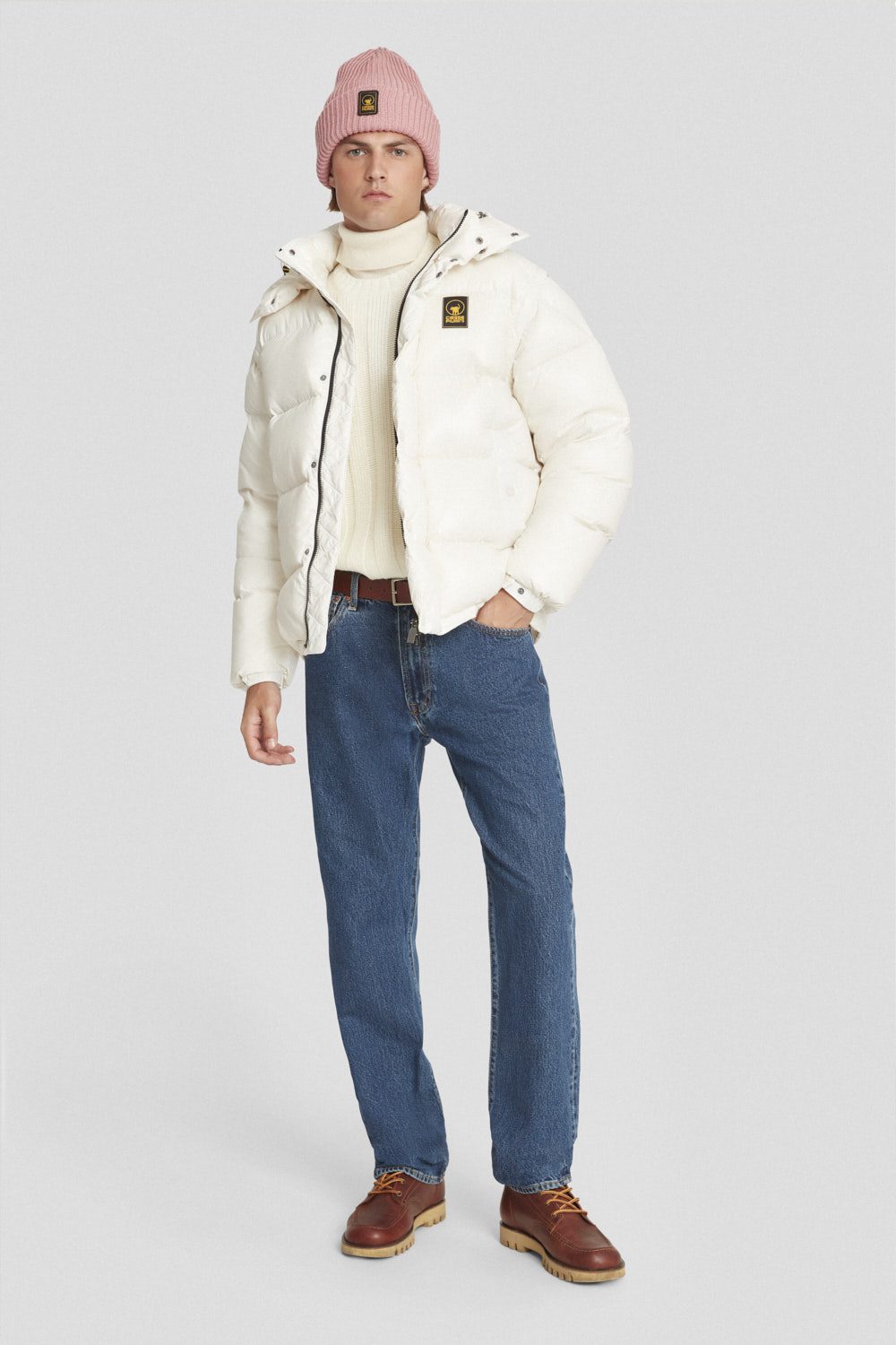 Piumino trapuntato bianco con cappuccio e maniche staccabili