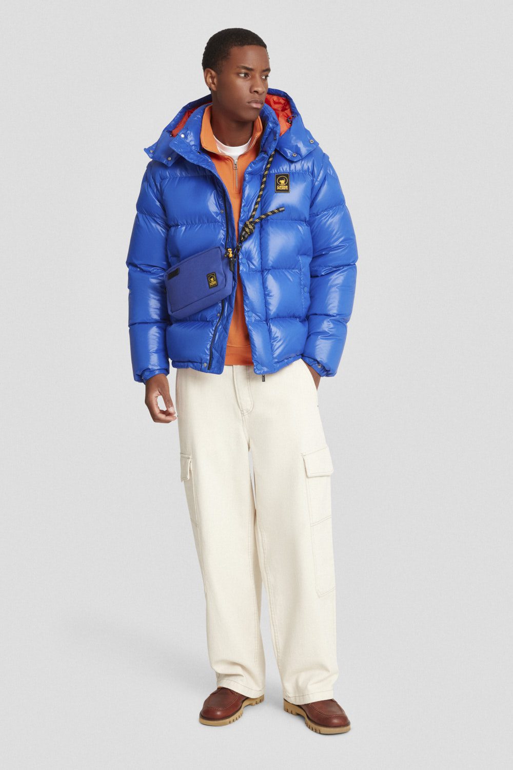 Piumino trapuntato royal blu con cappuccio e maniche staccabili