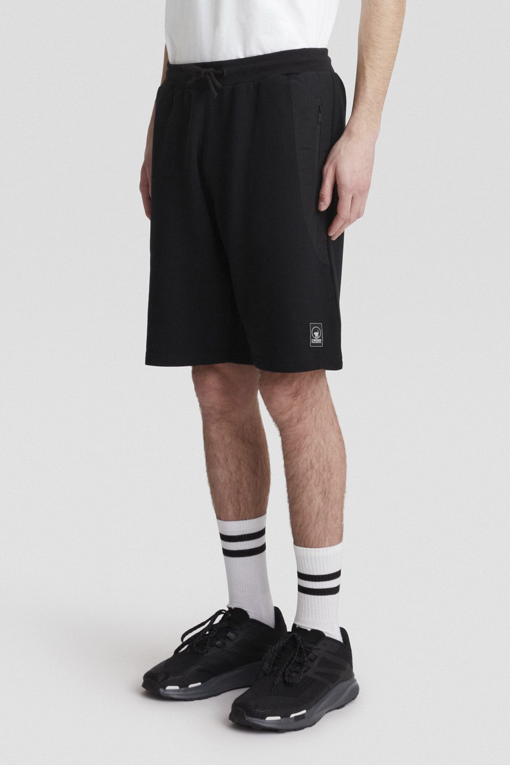 Pantaloni corti leggeri neri in tessuto tecnico