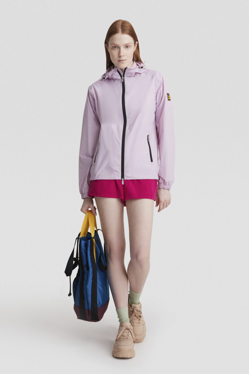 Giacca leggera antivento lilla con cappuccio