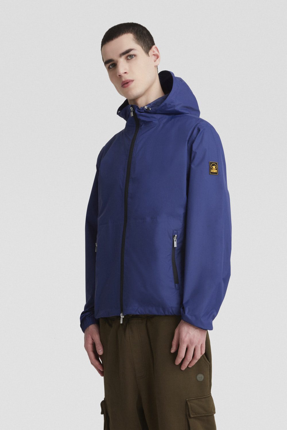 Giacca leggera antivento blu navy con cappuccio