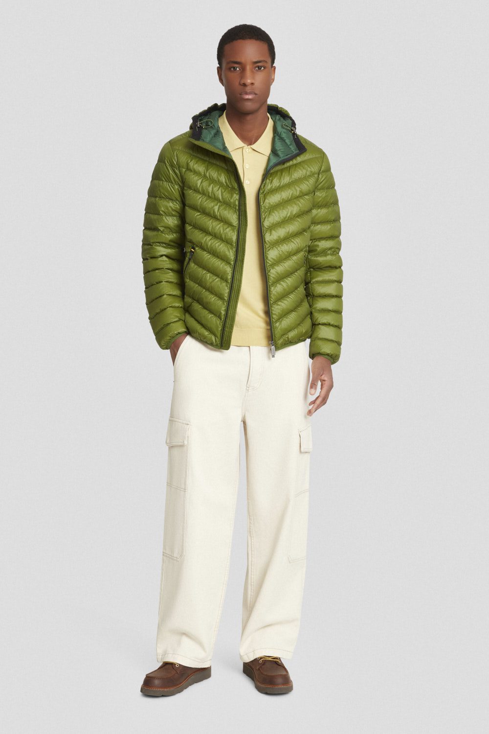 Piumino trapuntato verde con cappuccio