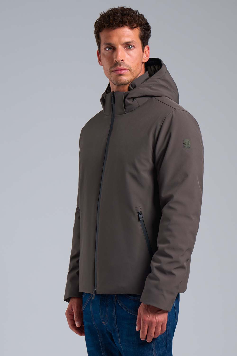 HERRING - Giacca verde militare in softshell con cappuccio