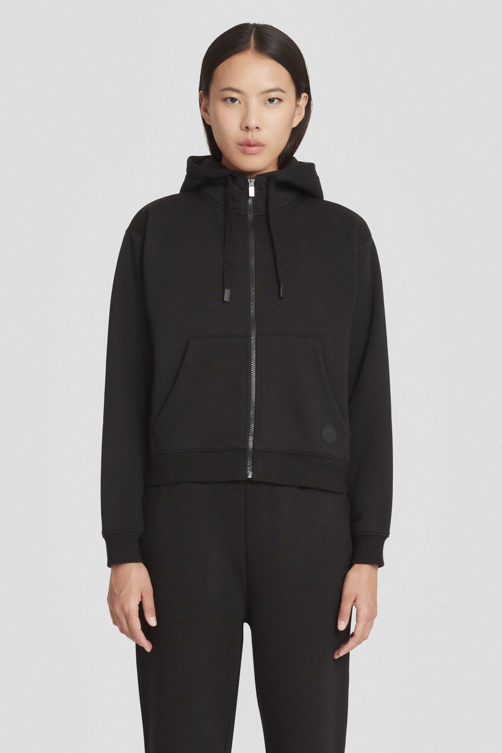 Felpa sportiva nera con zip