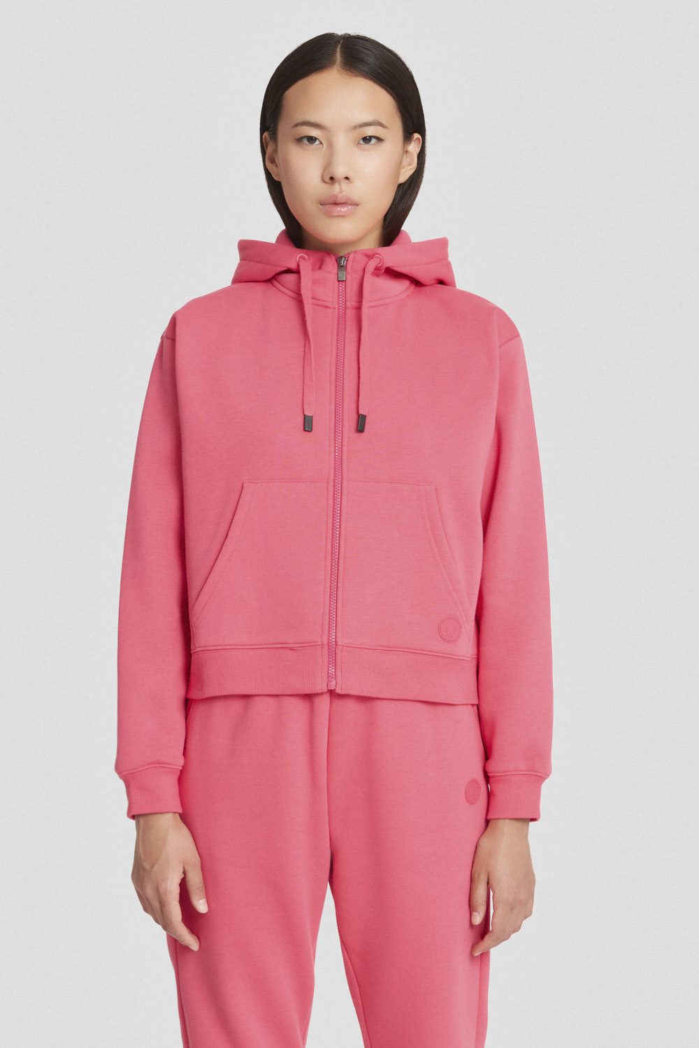 Felpa sportiva fucsia con zip