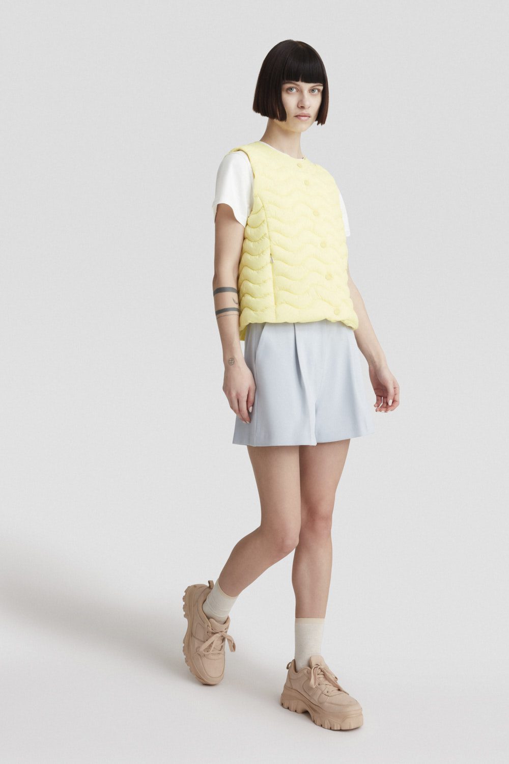 SAGITTA - Gilet giallo pastello con trapunta ad onde