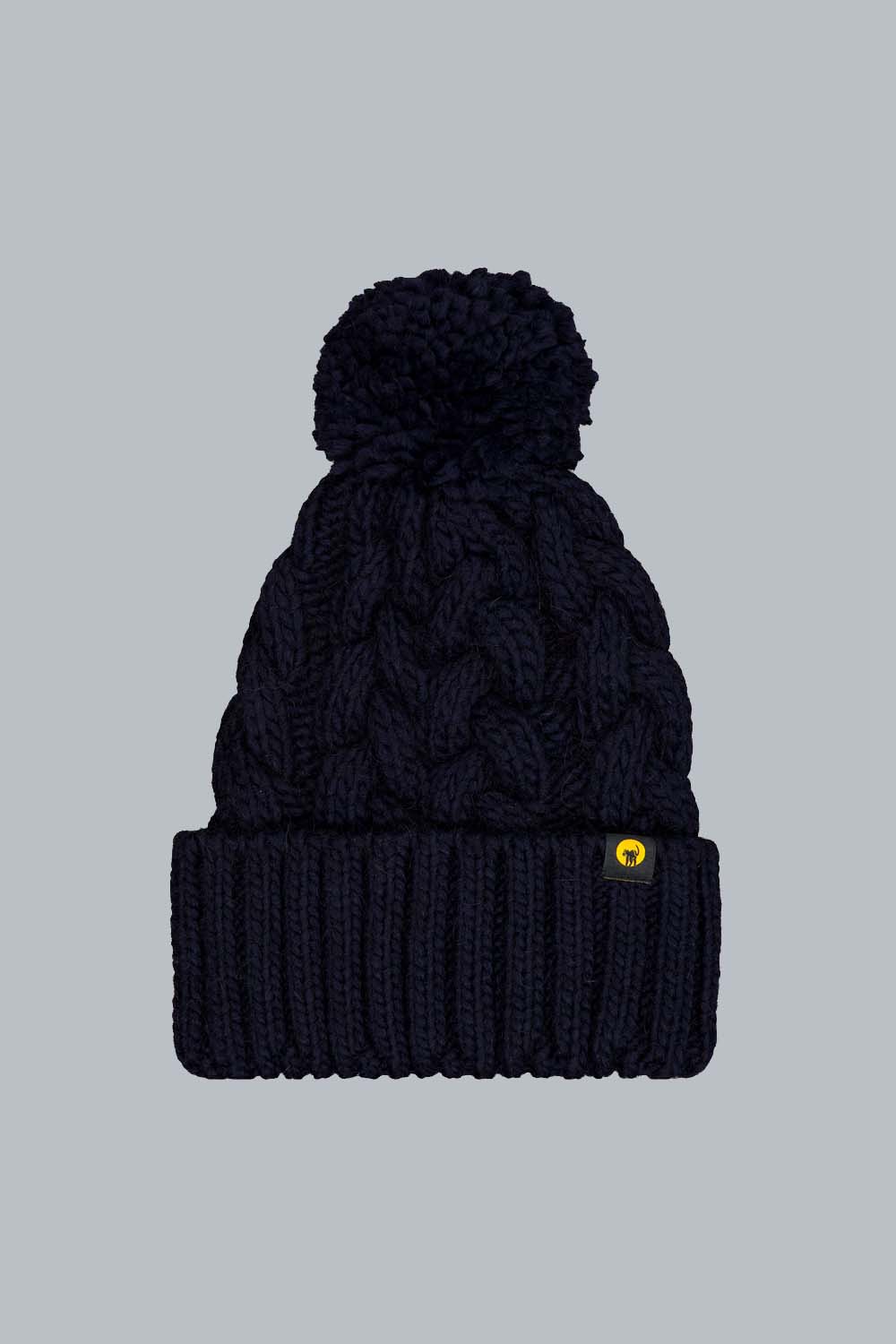 SCILLY - CAPPELLO IN MAGLIA A TRECCE BLU CON POMPON