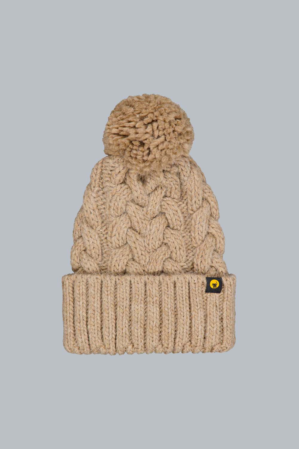 SCILLY – CAPPELLO IN MAGLIA A TRECCE COLOR TORTORA CON POMPON