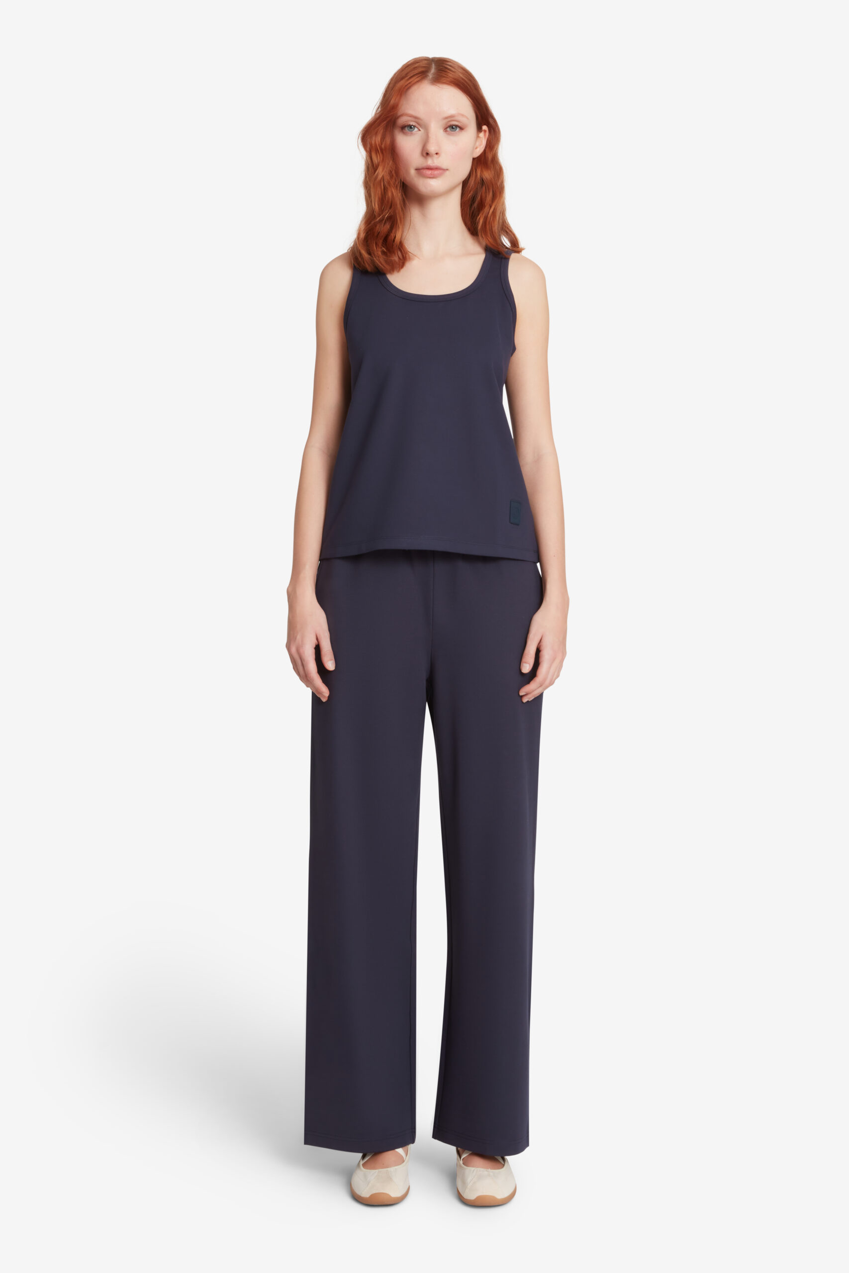 NIKITA - Pantaloni donna elasticizzati blu scuro